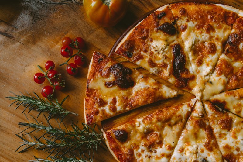 Pizza with fresh tomatoes and herbs